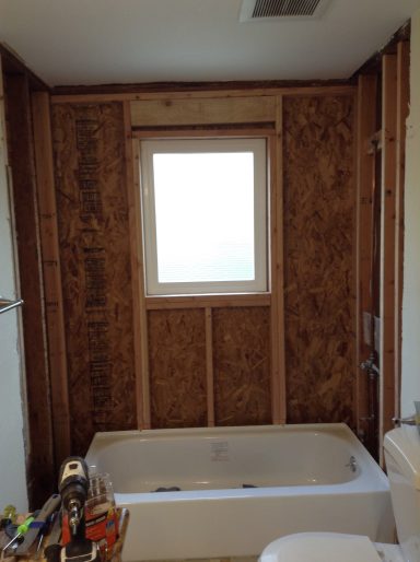 Bathroom window water damage repair